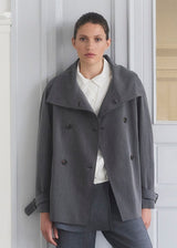 Loose double breasted jacket with button closure. MorganMD jacket has a high neck and wide sleeves with adjustable straps.