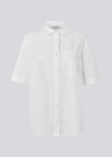 Shortsleeved shirt with a loose fit. MaudeMD SS shirt has cheast pocket, shirt collar and a button closure in front