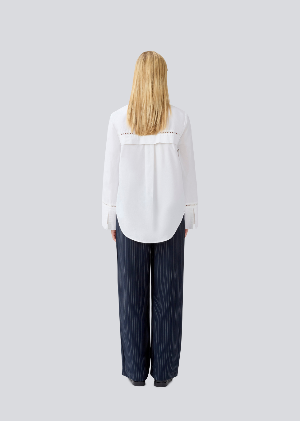 Oversize shirt with broderie anglaise details. MallenMD shirt has long wide sleeves with slits, shirtcollar and a button closure in front.