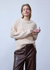 Soft knit in recycled polyester. Philipmd stripe O-neck has long sleeves and a round neckline. The model is 175 cm and wears a size s/36.