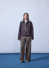 Short jacket in a wool mix. JustyMD short jacket has a loose fit, button closure and to pockets in front.