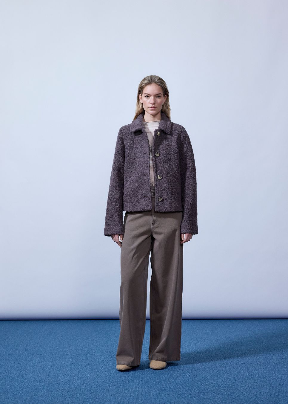 Short jacket in a wool mix. JustyMD short jacket has a loose fit, button closure and to pockets in front.