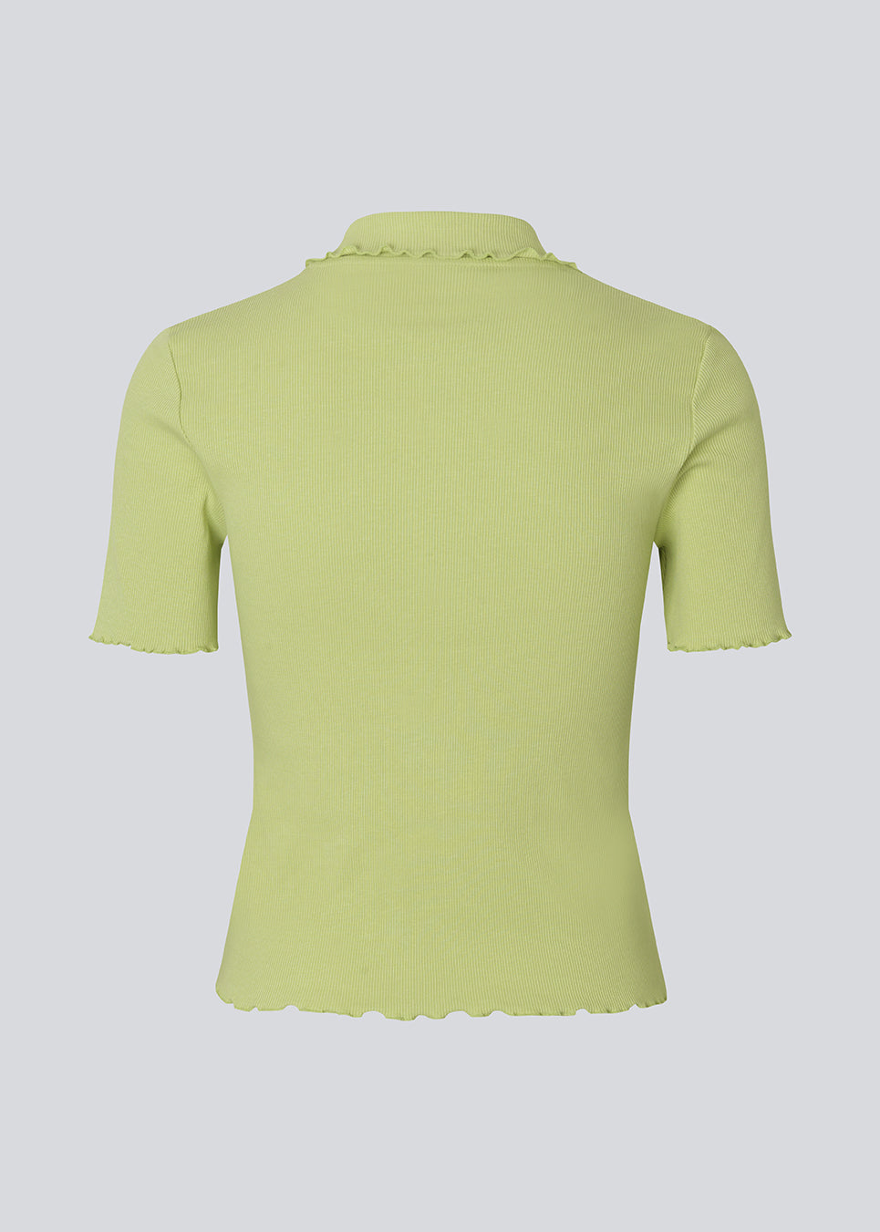 Fitted green polo in jersey. MagdaloneMD polo has short sleeves and babylock edges. 