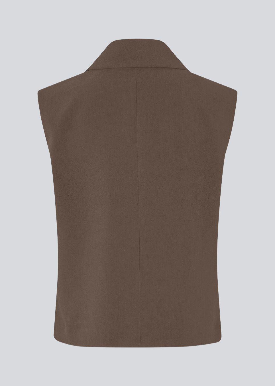 Loose vest with a collar in our classic gale material. Galemd vest is sleeveless and has a front button closure.