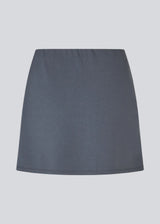 Short flared skirt in a stretchy material in dark blue. TurnerMD flare skirt has an elastic waistband. Match the skirt with the top: TurnerMD tank top.