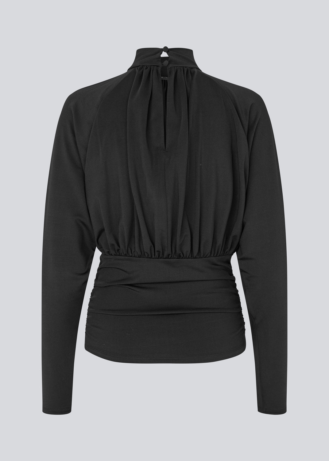 Elegant black blouse featuring a high neckline and long sleeves. Designed with delicate gathered details at the bust and waist to create a flattering silhouette. A subtle button closure at the back of the neck adds a refined and feminine touch. The stretchy fabric ensures a comfortable fit, while the draped design offers timeless elegance. Perfect for both everyday wear and special occasions.