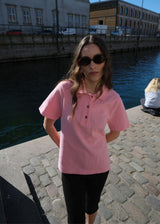 Short-sleeved polo in pink in 100% cotton pique with an embroidered logo. NobuMD LS polo has a placket with 3 buttons.