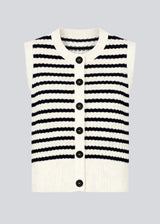 Knitted vest in navy and white with a round neckline and front button closure. The UlvaMD Stripe Top features a classic striped pattern and wide ribbed trims for a flattering fit. Made from 100% organic cotton – perfect for layered styling. 