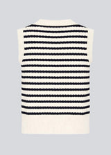 Knitted vest in navy and white with a round neckline and front button closure. The UlvaMD Stripe Top features a classic striped pattern and wide ribbed trims for a flattering fit. Made from 100% organic cotton – perfect for layered styling. 