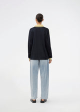 Football jersey made in collaboration with the Danish football team Brøndby Women. The 1971 Polo in navy with yellow details features a loose fit, with a placket closure and collar, as well as long sleeves that have ribbed cuffs. The polo features Brøndby Women and Modström logos on the chest.