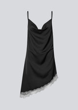 Short satin slip dress with contrast lace trim. The AlinkaMD Dress features spaghetti straps, a V-neckline, and an asymmetrical hem that is longer on one side. An elegant dress, perfect on its own or for layered styling.