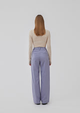 Pants in a relaxed fit. AnkerMD wide pants have a regular waist with pleats in front and wide, long legs. Decorative back pockets and side pockets.