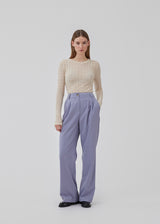 Pants in a relaxed fit. AnkerMD wide pants have a regular waist with pleats in front and wide, long legs. Decorative back pockets and side pockets.