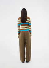 Long-sleeve cardigan with a polo collar and stripes. The AslanMD Cardigan is made from ribbed 100% organic cotton with elastic for a snug and comfortable fit. Perfect for layering or as an elegant everyday favorite.