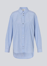 Long shirt with pinstripes. The BalouMD Shirt features unique silver buttons, a collar, cuffs, and a longer back hem - a sleek and modern statement top, made from 100% recycled polyester.