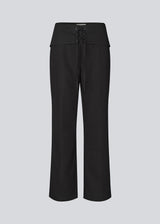Classic tailored trousers with lace-up detail. The Beamd Pants feature straight legs, a zip closure, and an edgy lace-up detail at the front. The clean cut creates a sharp, modern look with a twist. Made from 78% recycled polyester for a more responsible choice.
