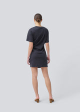 Black jersey dress with short sleeves. BrazilMD dress has a relaxed fit and gatherings on the side. 