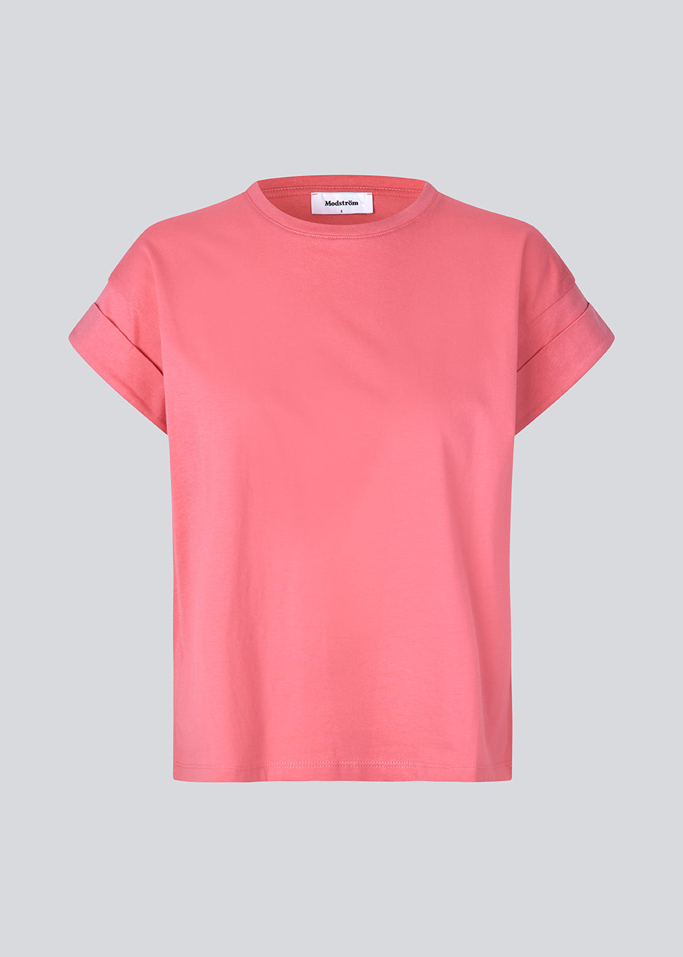 Pink t-shirt in organic cotton with a slightly cropped length. BrazilMD short t-shirt has a rounder neck and rolled-up sleeves. 