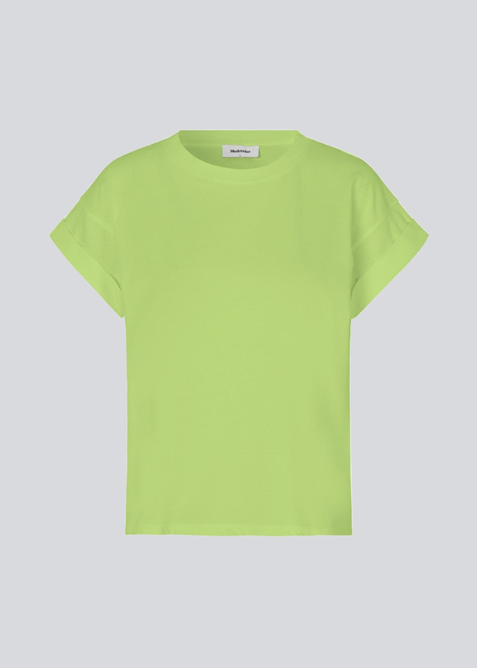 T-shirt in organic cotton in lime green with a slightly cropped length. BrazilMD short t-shirt has a rounder neck and rolled-up sleeves. 