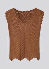Crochet top without sleeves in a multicolored organic cotton. CaryMD top has detailed trimmings and a deep v-neckline in the back.