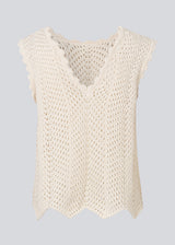 Crochet top without sleeves in a multicolored organic cotton. CaryMD top has detailed trimmings and a deep v-neckline in the back.