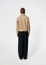 Short jacket with a timeless, sophisticated aesthetic. Cleamd jacket features a relaxed, slightly boxy silhouette with a double-breasted button closure, classic collar, and raglan sleeves for a soft and comfortable fit. Discreet side pockets and clean lines enhance the minimalist design, while the cropped length makes it perfect for both everyday wear and more polished looks.
