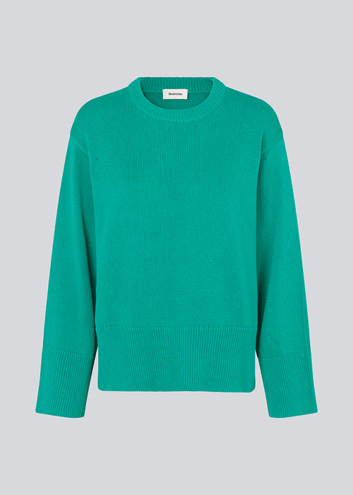 Fine-knitted oversize jumper knitted from cotton. CorbinMD o-neck has ribbed round neckline, long wide sleeves, and wide ribbing at cuffs and hem.