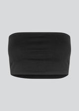 Fitted tube top in black in soft, rib-knitted cotton quality. DaeMD tube top has a sweetheart neckline with a silicone trim on the inside.