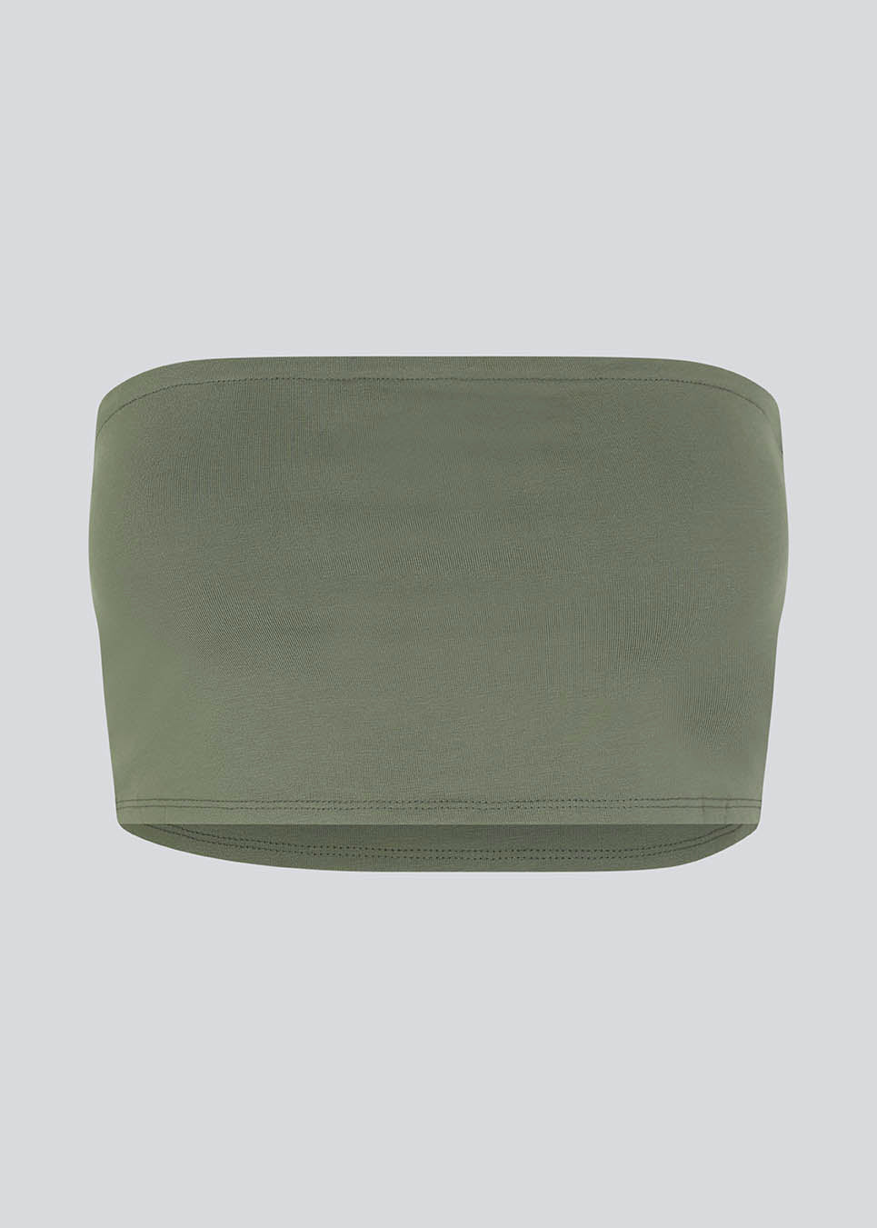 Fitted tube top in soft green in soft, rib-knitted cotton quality. DaeMD tube top has a sweetheart neckline with a silicone trim on the inside.