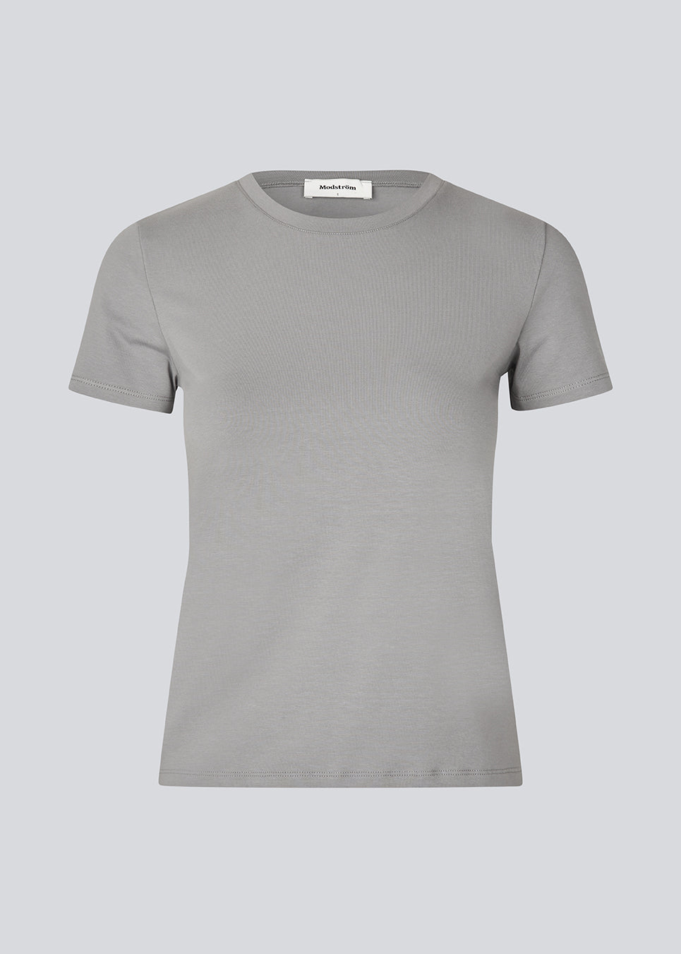 Tight fit basic top with a high and straight neckline in grey. DaeMD top is made from a rib-knit organic cotton. The model is 177 cm and wears a size S/36.