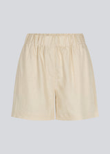 Shorts in summer sand in a relaxed fit, wide legs, and an elasticated waistband. DarrelMD shorts are crafted from a linen material. 