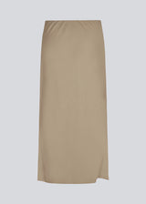 Upgrade your wardrobe with the DarrelMD Long Skirt in Light Brown Linen Blend. This elegant skirt features an elastic waist for a comfortable fit and a relaxed silhouette. Perfect for everyday wear or special occasions, this light brown skirt combines style and comfort effortlessly.