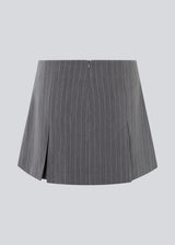 Short skirt in grey pinstripe with bows and box pleats. EmiliaMD bow skirt has an invisible zipper at the back and a cute bow detail in front.<br>