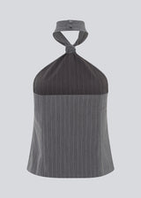 Fitted top in grey pinstripe with a cool tie detail. EmiliaMD tie top has an invisible zipper at the side and a button closure at the neck.