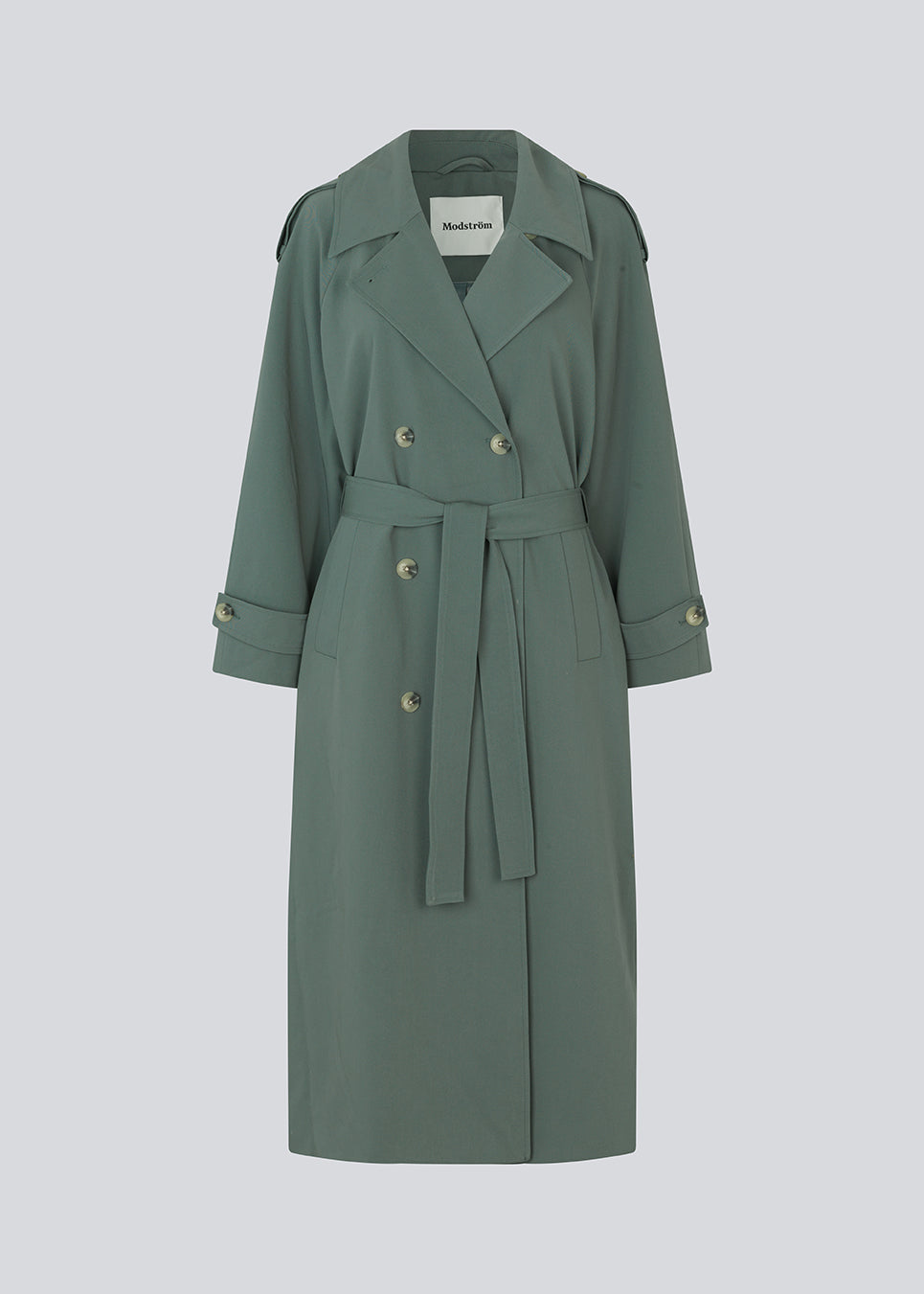 Oversized double-breasted trenchcoat with tie belt at the waist. EvieMD jacket has dropped shoulders and long, wide sleeves. Lined.