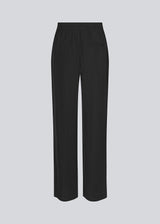 FanyaMD pants in black have a menswear-inspired look with straight, wide legs, a high waist with zip fly and button and elastication in back. Doubble pleat in front and side pockets.