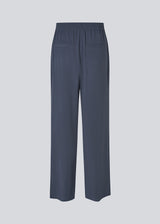 FanyaMD pants have a menswear-inspired look with straight, wide legs, a high waist with zip fly and button and elastication in back. Doubble pleat in front and side pockets