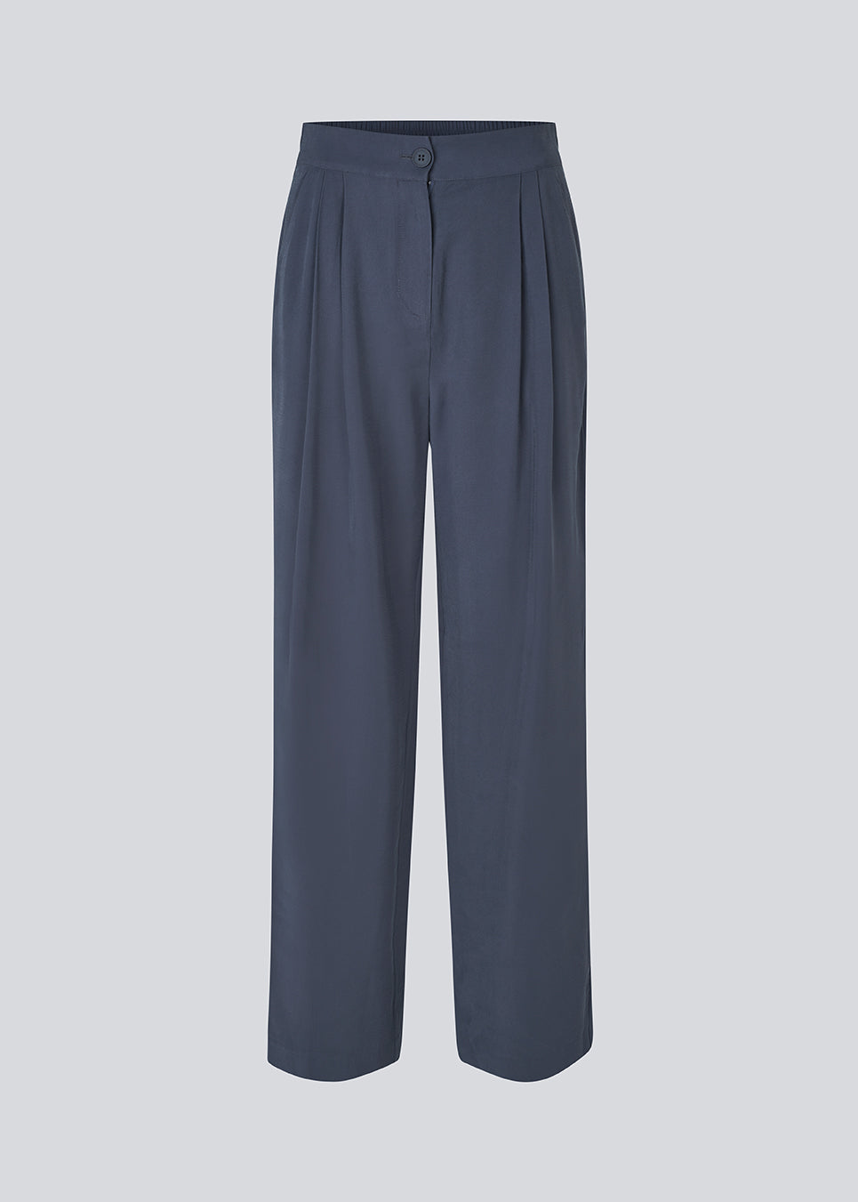 FanyaMD pants have a menswear-inspired look with straight, wide legs, a high waist with zip fly and button and elastication in back. Doubble pleat in front and side pockets
