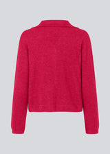 Fine knit cardigan in pink with a v-neckline and collar. FaroMD cardigan has a relaxed shape with matching buttons in front and ribbed trimmings. The model is 175 cm and wears a size S/36.