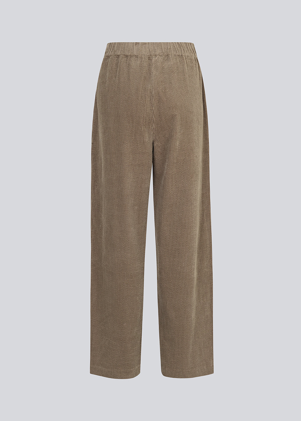 Corduroy pants in beige with long, wide legs and a high waist with zip fly and button, and elastic on the back. FikaMD pants are lined.