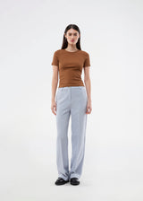 Gale pants has a classic design. The pants has straight, wide legs with pressfolds, which creates an elegant look.