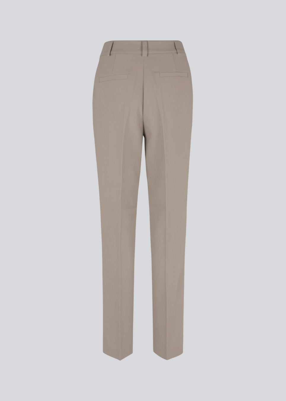 Gale pants have a classic design. The pants have straight, wide legs with press folds, which creates an elegant look. These pants have a spacious fit. We recommend sizing down.