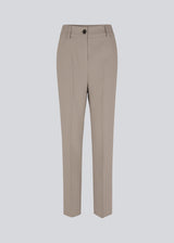 Gale pants have a classic design. The pants have straight, wide legs with press folds, which creates an elegant look. These pants have a spacious fit. We recommend sizing down.