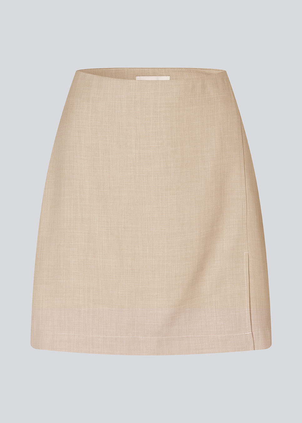 Classic A-line skirt with a short length in beige. GaleMD 2 skirt has a simple design with a hidden zipper at the side seam and a slit in front. 