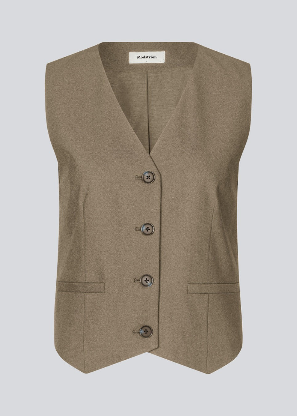 Tailored vest in light brown in woven quality with a v-neckline, buttons in front and fake paspel pockets. GaleMD 2 vest is fully lined. 