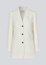 Gale blazer in white has a classic and elegant design, fulfilled by the beautiful revers collar and a long fit. The blazer has button closure at the front and a chest pocket at the left side.  Shop the look: Gale pants.