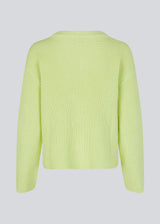 GalenMD v-neck in bright greenis knitted from an organic cotton with an oversize fit, long wide sleeves, a v-neck, and dropped shoulders. The model is 175 cm and wears a size S/36.<br>