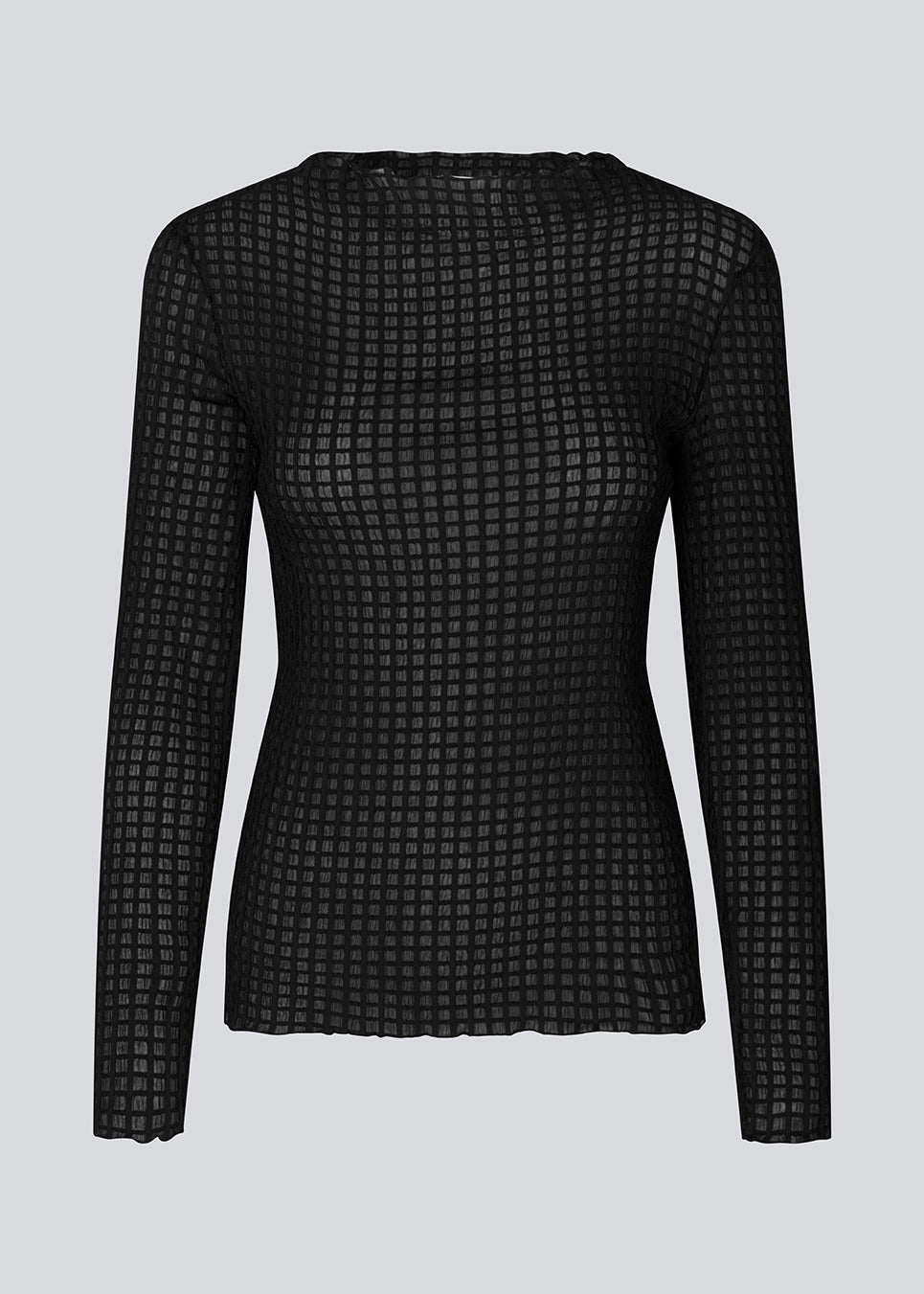 GeniferMD top is made in a slightly transparent quality with a tight fit. The top has long sleeves and a semi-high neckline with lettuce hems.