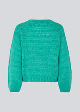 Woolen jumper in green with long stitches for a relaxed look. GroverMD o-neck has long sleeves with volume, a round neck with ribbed details. Contains wool and alpaca.