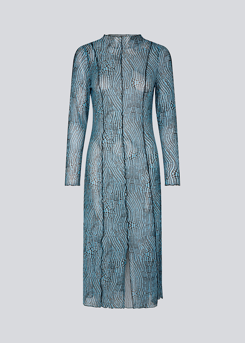 Mesh dress with a high neck, long sleeves and midi length. GwenMD print dress has decorative lettuce hems on the body, neck and sleeves. The dress has a slit in front and is slightly transparent. The model is 175 cm and wears a size S/36.